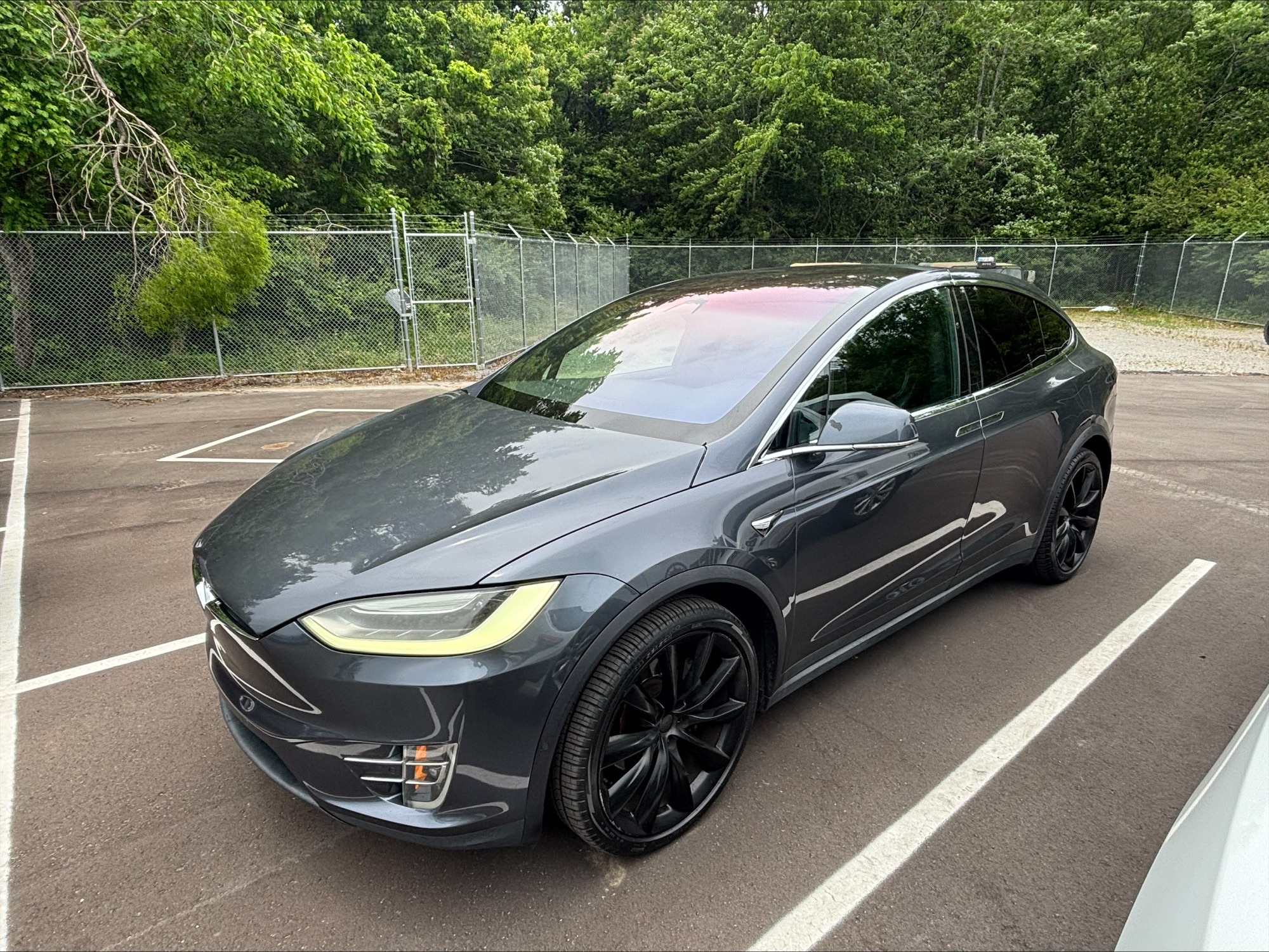 2017 Tesla Model X Mileage: 84,181 Gray car, black rims. side view