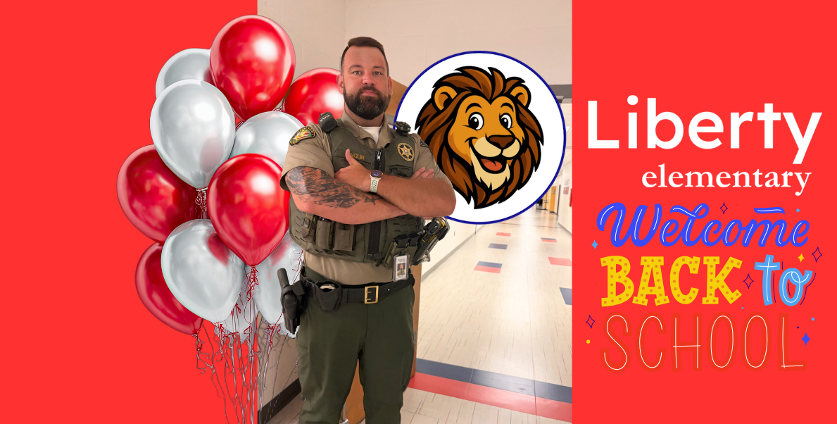 WCSO SRO Deputy Anglin stands with his arms crossed in a hallway at Liberty Elementary School. The graphic features red and silver balloons, the Liberty Elementary lion mascot, and colorful “Welcome Back to School” artwork on a bright red background.