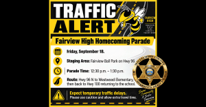 Traffic alert graphic for the Fairview High Homecoming Parade on Friday, September 18. The black-and-yellow design features the Fairview Yellow Jackets mascot and a Williamson County Sheriff’s Office badge. The parade stages at Fairview Ball Park on Highway 96 and runs from 12:30 p.m. to 1:30 p.m. The route travels Highway 96 North to Westwood Elementary, then back to Highway 100 and returns to the school. The graphic advises motorists to expect temporary traffic delays, use caution, and allow extra travel time.