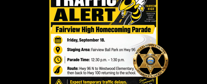 Traffic alert graphic for the Fairview High Homecoming Parade on Friday, September 18. The black-and-yellow design features the Fairview Yellow Jackets mascot and a Williamson County Sheriff’s Office badge. The parade stages at Fairview Ball Park on Highway 96 and runs from 12:30 p.m. to 1:30 p.m. The route travels Highway 96 North to Westwood Elementary, then back to Highway 100 and returns to the school. The graphic advises motorists to expect temporary traffic delays, use caution, and allow extra travel time.
