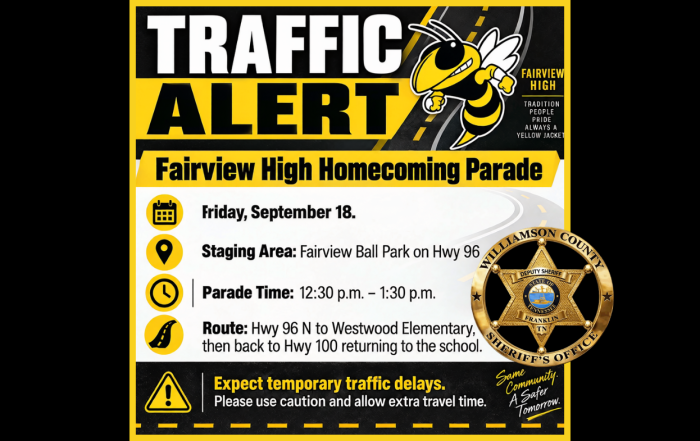 Traffic alert graphic for the Fairview High Homecoming Parade on Friday, September 18. The black-and-yellow design features the Fairview Yellow Jackets mascot and a Williamson County Sheriff’s Office badge. The parade stages at Fairview Ball Park on Highway 96 and runs from 12:30 p.m. to 1:30 p.m. The route travels Highway 96 North to Westwood Elementary, then back to Highway 100 and returns to the school. The graphic advises motorists to expect temporary traffic delays, use caution, and allow extra travel time.