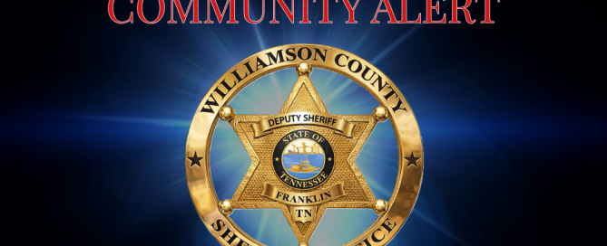 Williamson County Sheriff's Badgem with Community Alert in red letters above the official badge.